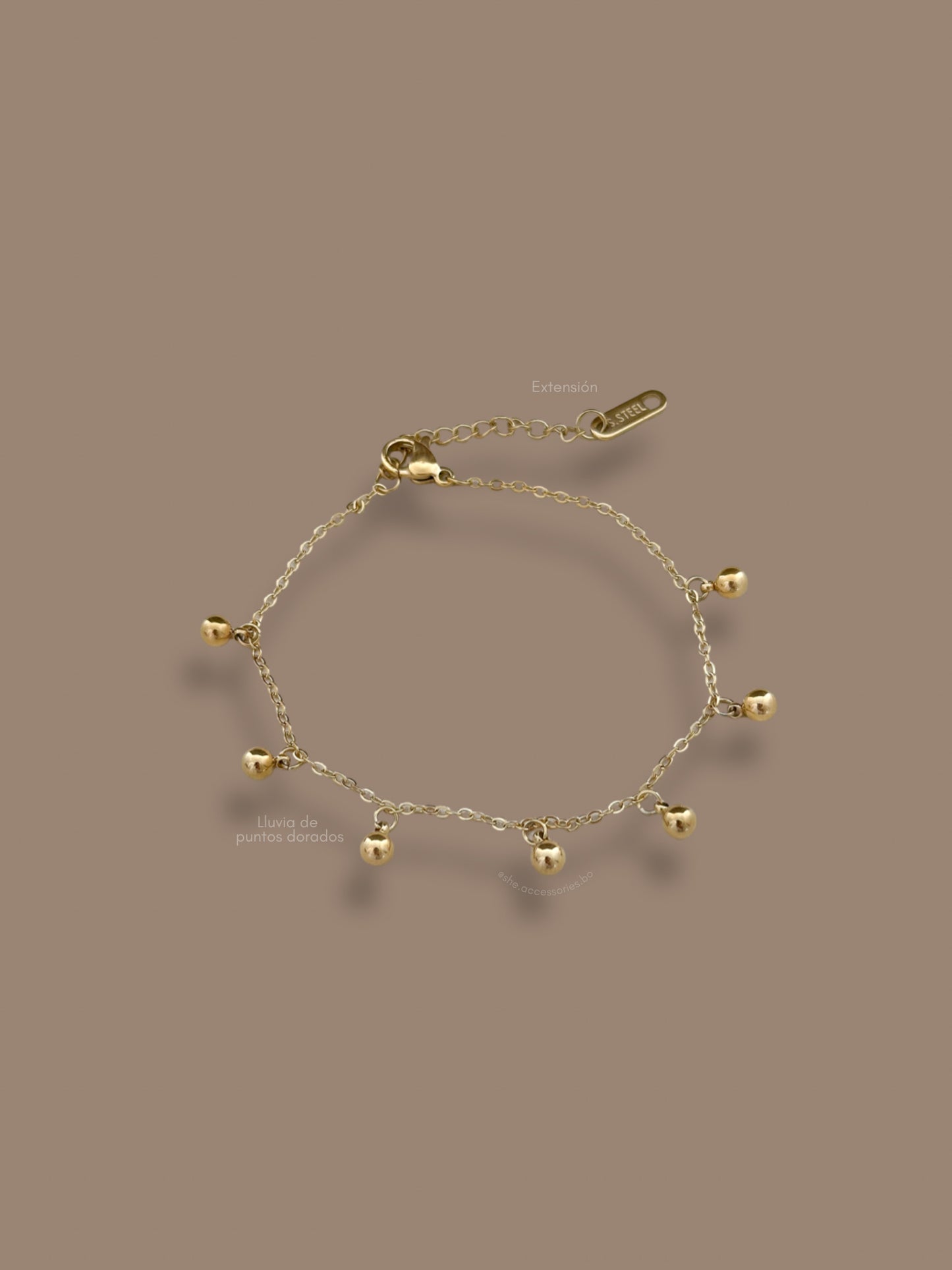 Pulsera lluvia de puntos dorados