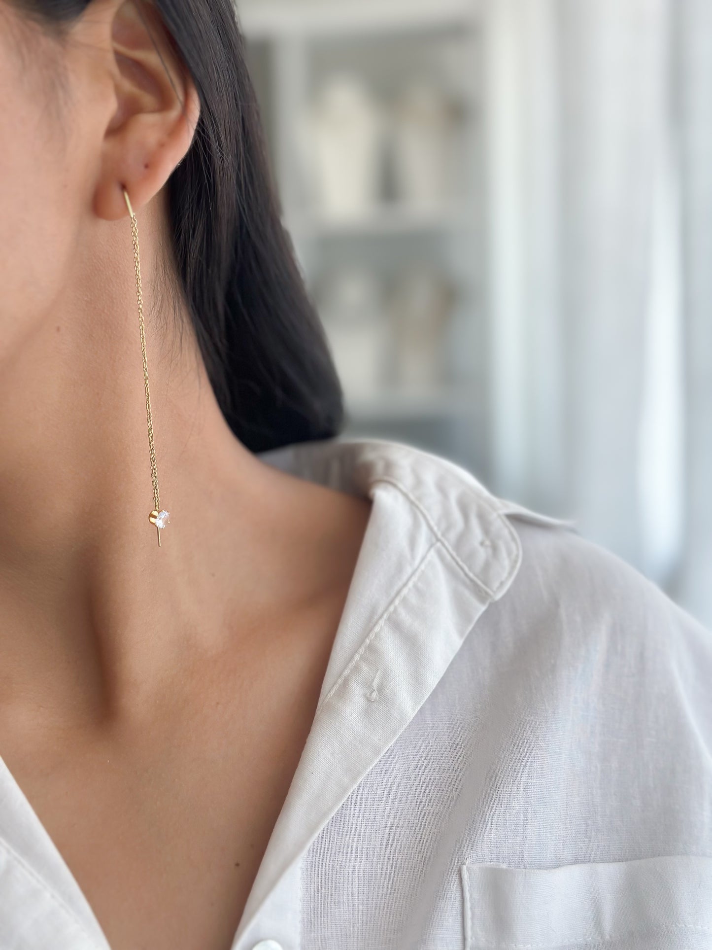 Aretes con punto de luz colgante