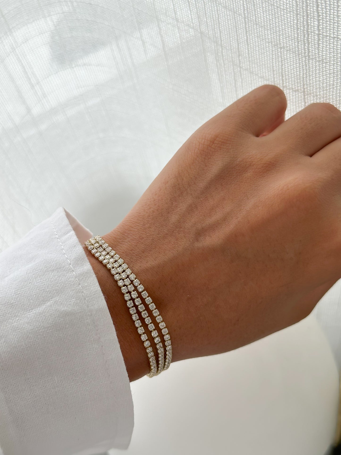 Pulsera triple regulable