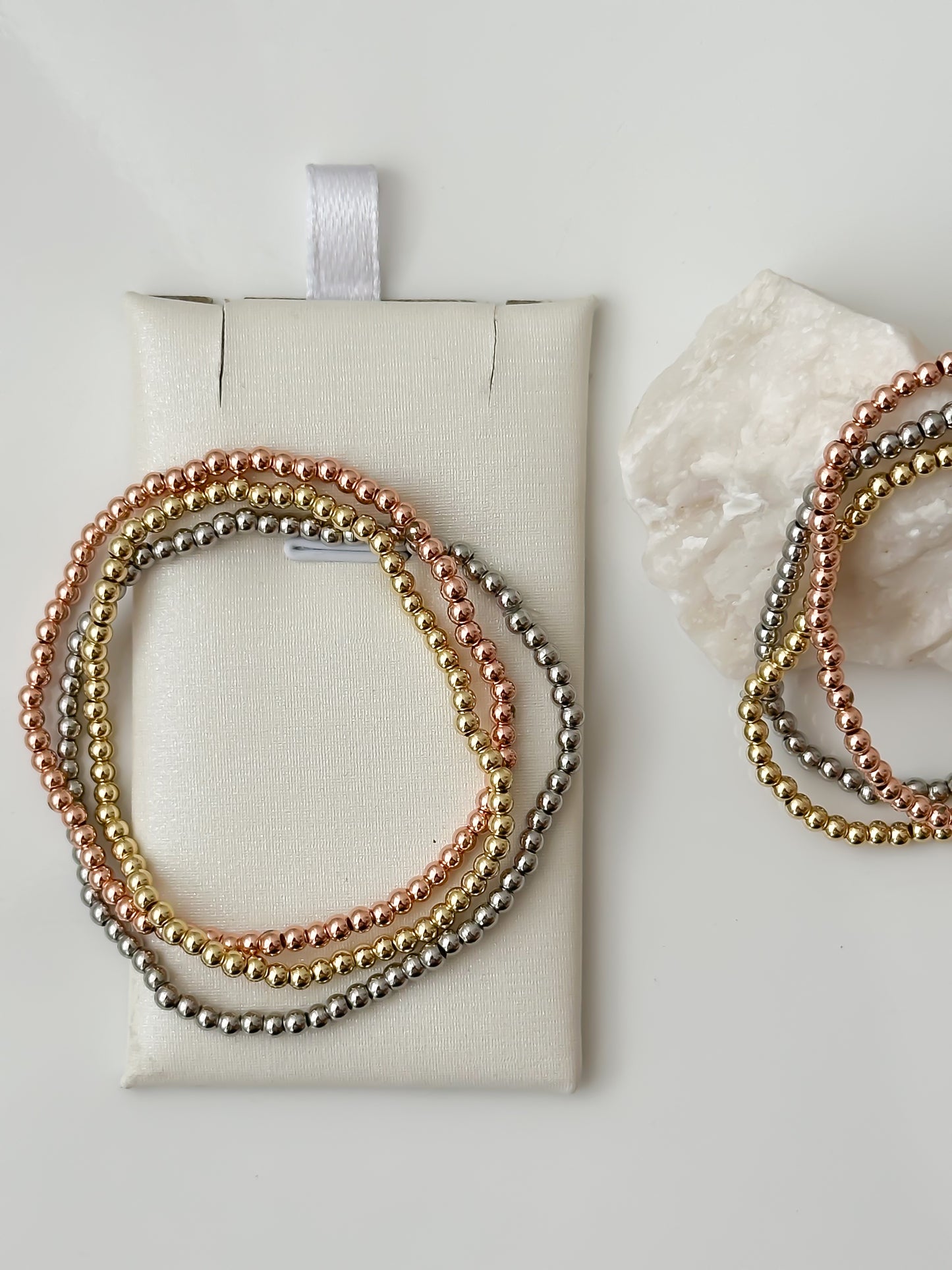 Trío de pulseras elásticas