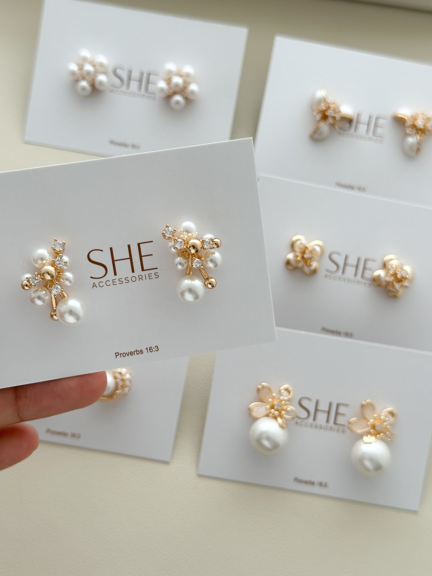 aretes flor perla mitad