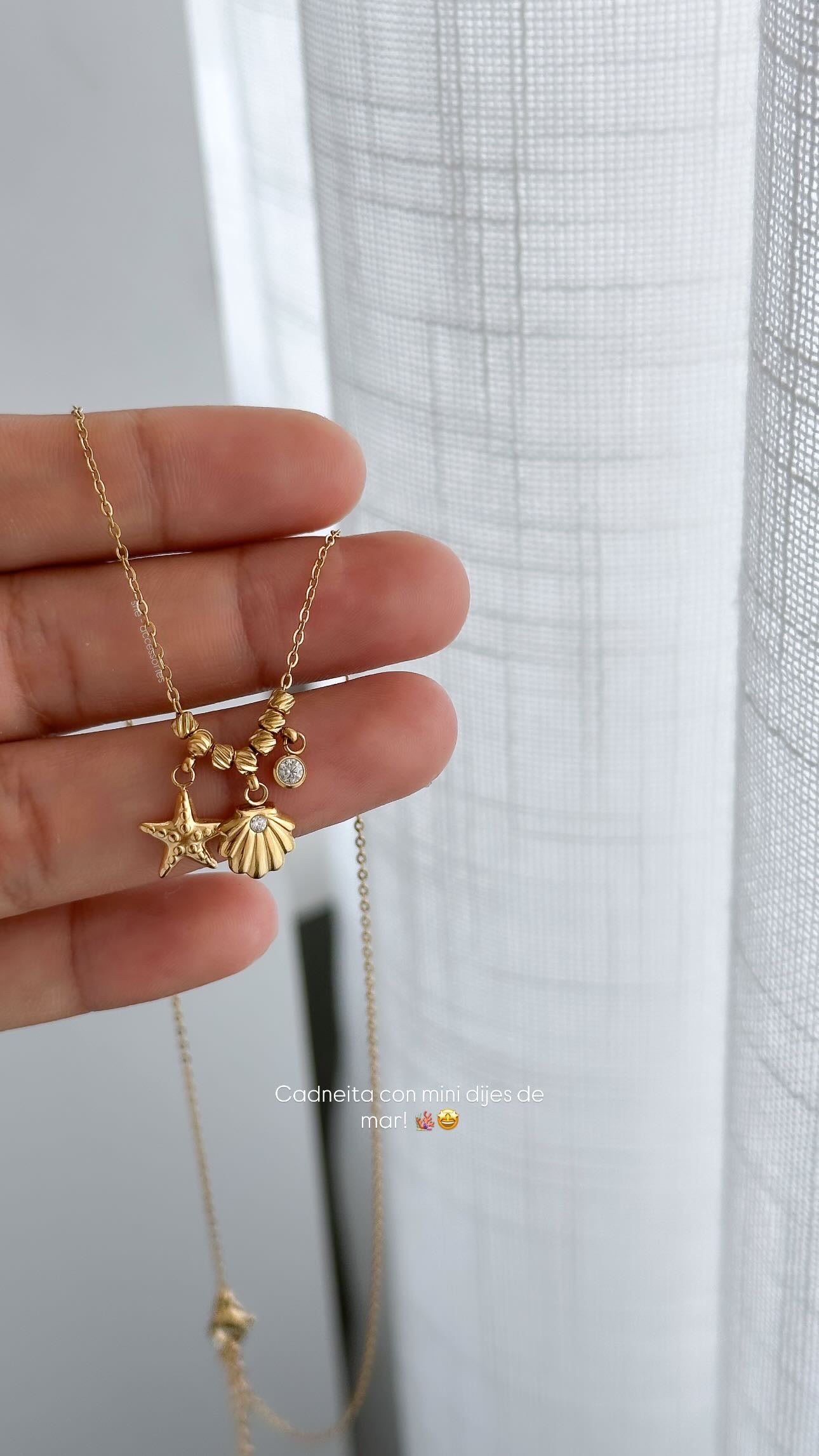 Cadneita con mini dijes de mar