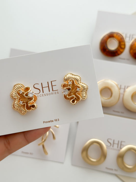 aretes flor mitad
