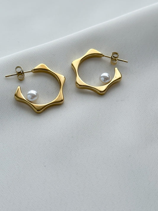 Aretes detalle pero