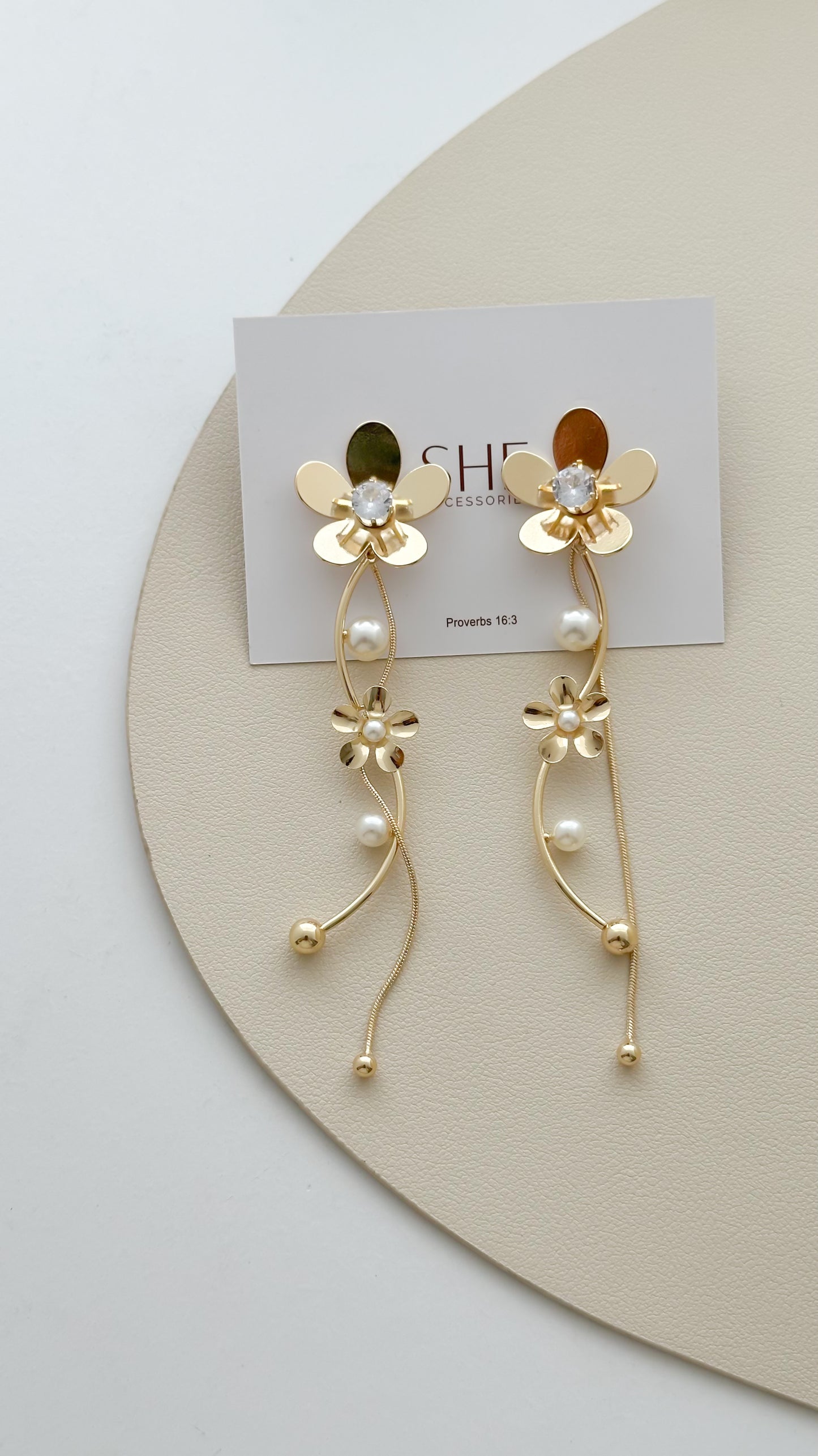 aretes flor mitad