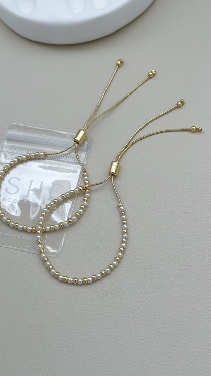 Pulsera regulable mini perlas y doraod C/u