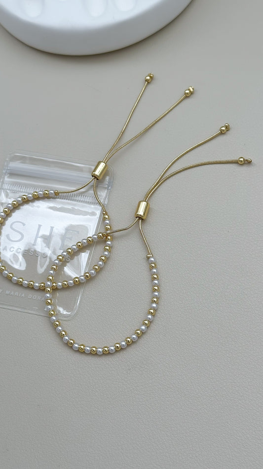Pulsera regulable mini perlas y doraod C/u