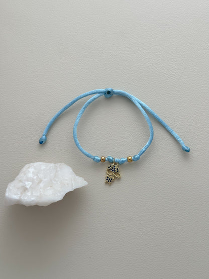 Pulsera hilo simple celeste