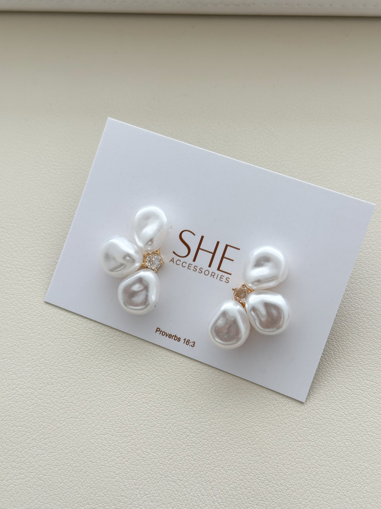 aretes flor mitad