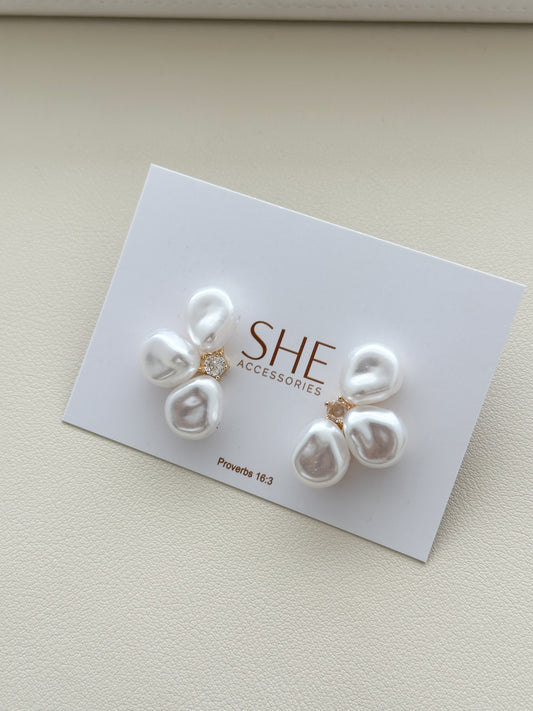 aretes flor mitad