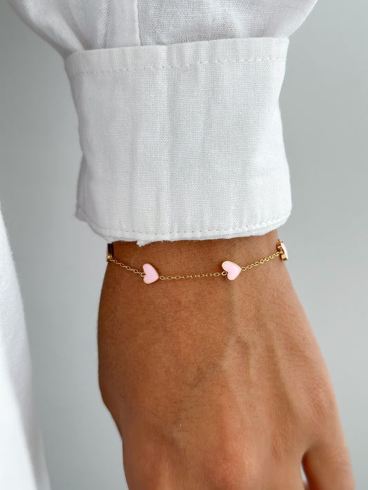 Pulsera corazones rosados