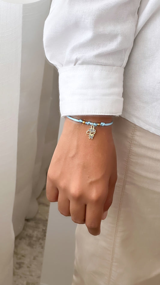 Pulsera hilo simple celeste